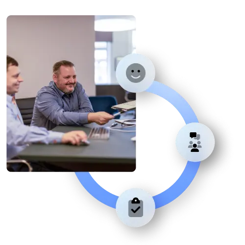 Two Frisbii experts sitting at a desk presenting something